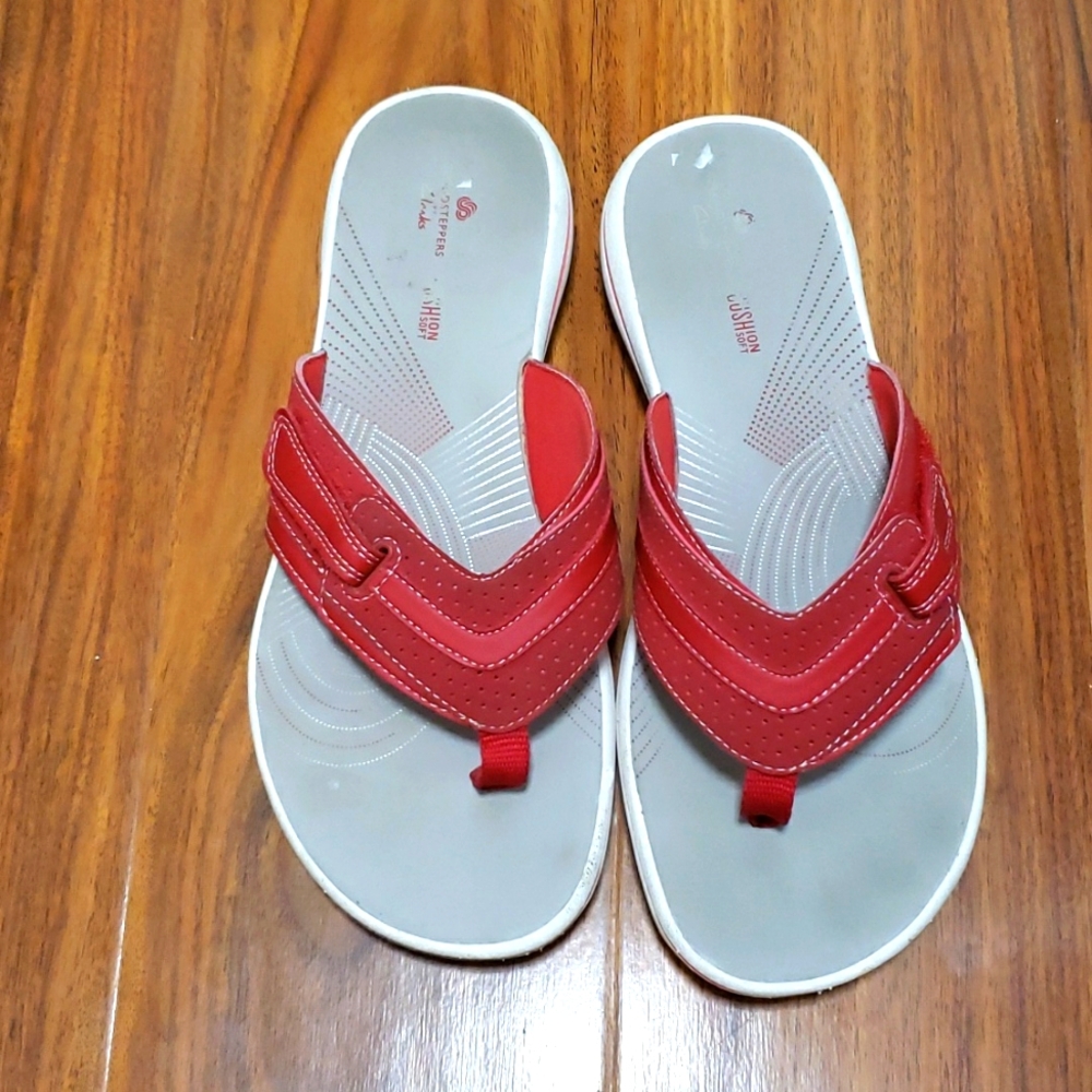 Red Clarks Cloudsteppers flip flops